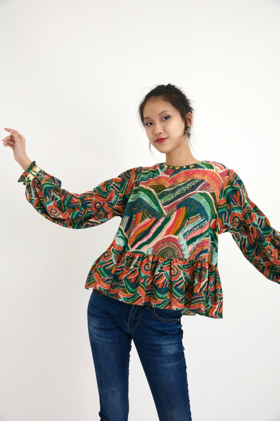 "Handpainted iconic ocean wave multi-color cotton frill top with hand-embroidered with sequins, beads, and flower details. 100% Handwoven cotton silk; Lining: 100% cotton 100% Azo Free Dry Clean Only"