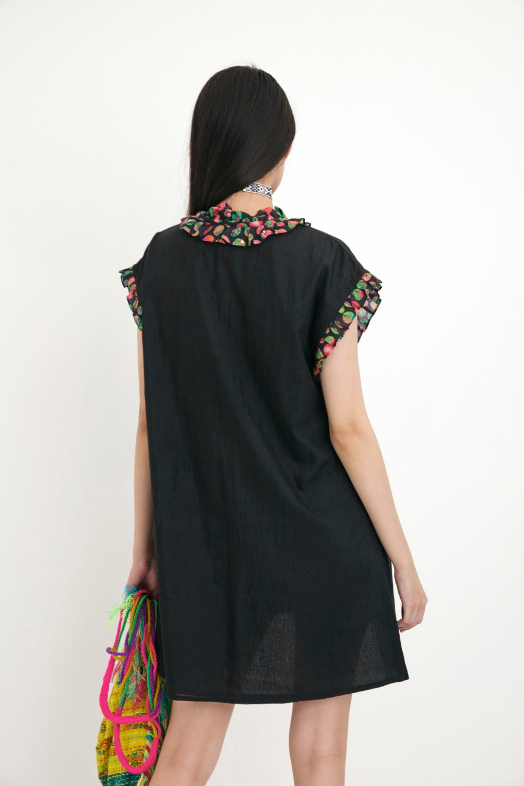 "Handwoven solid cotton silk black tunic with polka dot in frill detail and hand embroidery in sequins detail.  100% Handwoven cotton silk 100%  Azo free"