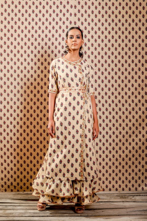 BEIGE HANDWOVEN ANGRAKHA PAIRED WITH HAND EMBROIDERED BELT, DOUBLE LAYERED SHARARA AND COTTON MULMUL DUPATTA.