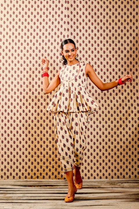 BEIGE JACKET PAIRED WITH SALWAR PANTS.