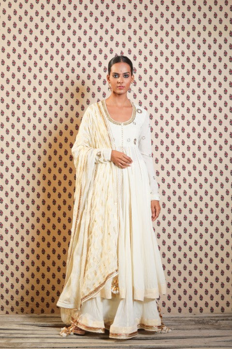 IVORY HANDWOVEN JAMDANI ANARKALI PAIRED WITH SOFT GAUZE COTTON SKIRT WITH SOFT GAUZE COTTON DUPATTA.