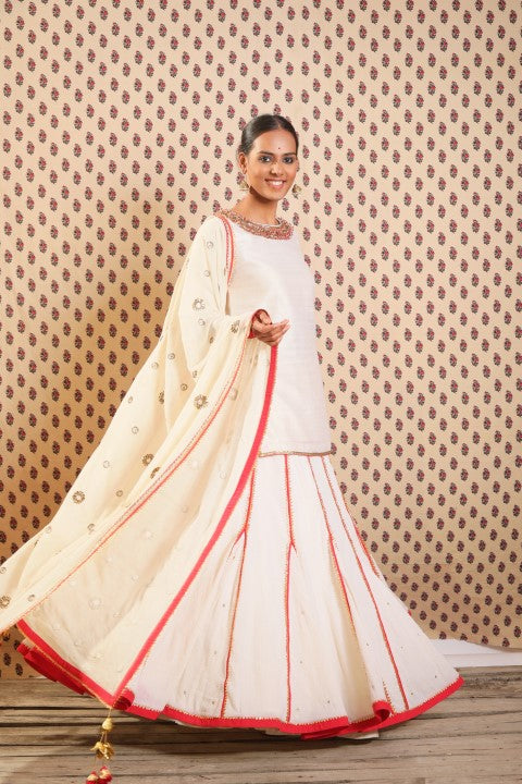 IVORY RAW SILK SHORT KURTA PAIRED WITH HAND CRUSHED COTTON LEHENGA AND IVORY HANDWOVEN JAMDANI DUPATTA.