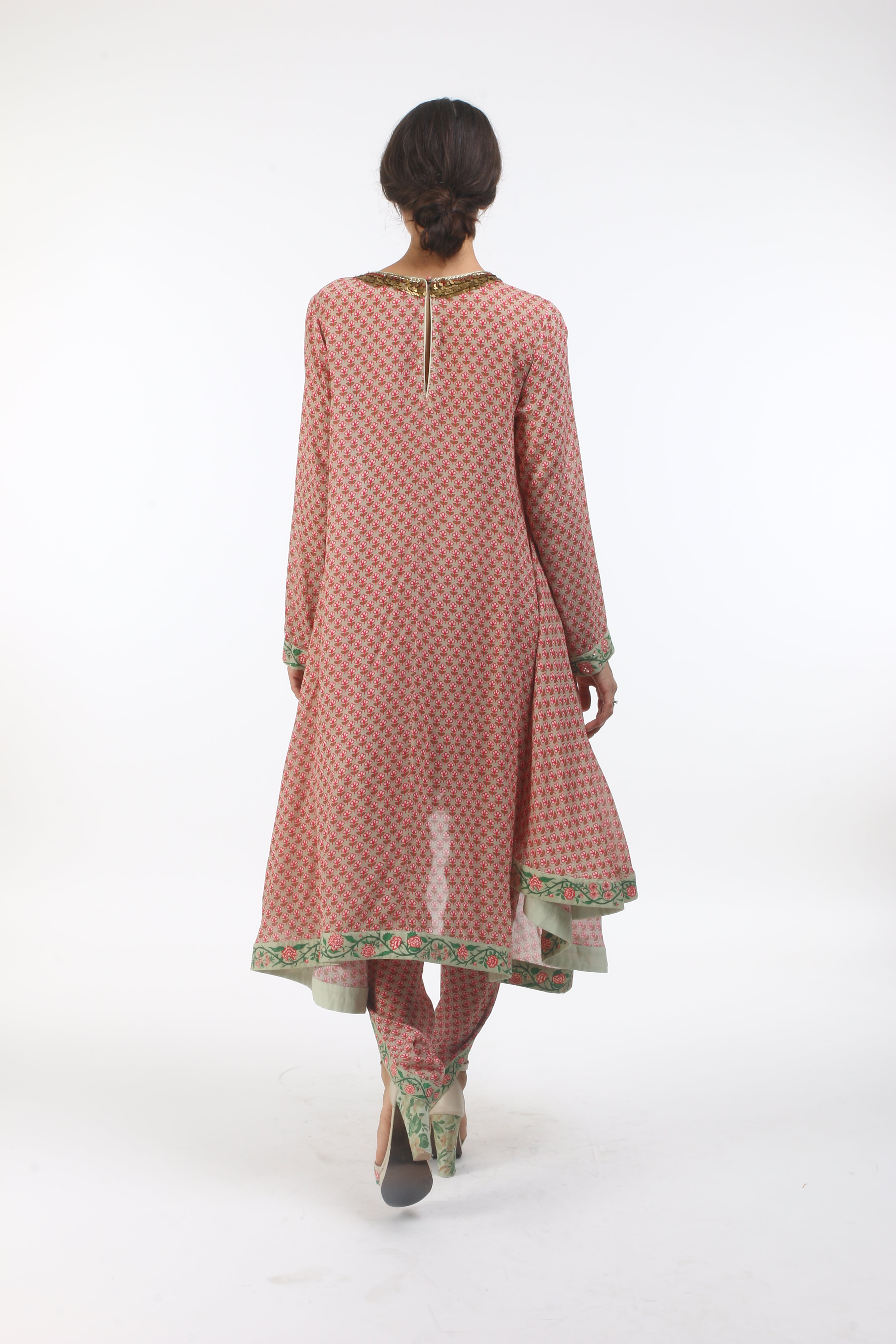 asymmetrical georgette Kurtha in layered coin embroidered neckline with overlap dhoti in crepe.