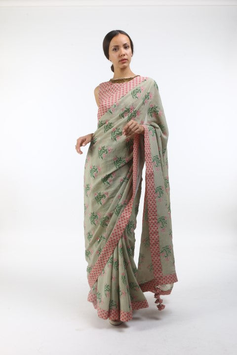 Bloom antique jade hibiscus printed & embellished saree in crepe, with new sanga printed blouse in layered coin embroidered neckline.