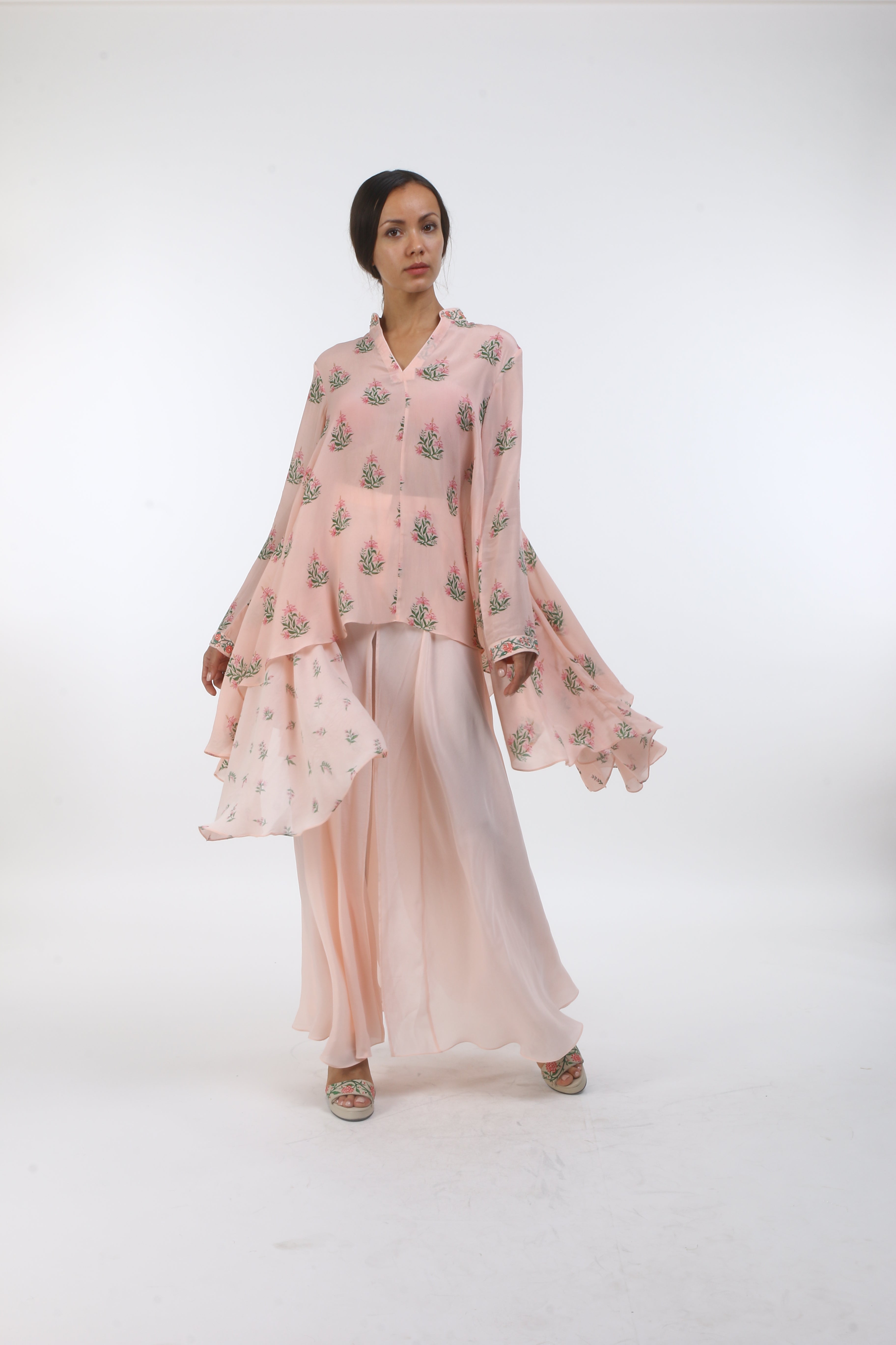Bloom salmon pink hibiscus printed asymmetrical crepe tunic with bouquet side godet’s and front open sharara.