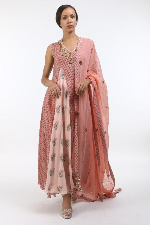 Bloom salmon pink new sanga printed kurtha in hibiscus godet & floral organza embroidered neckline, with churidar and printed & embroidered dupatta.