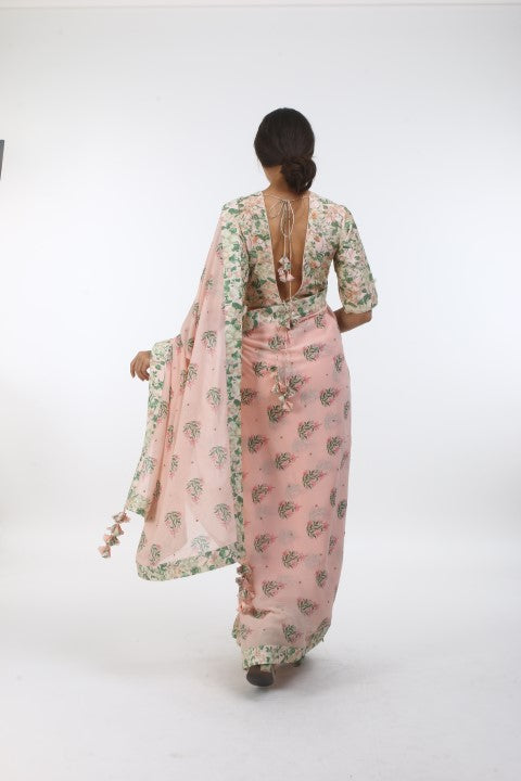 Bloom salmon pink hibiscus printed & embellished georgette saree with bibi jaal printed and organza embroidered chanderi blouse.
