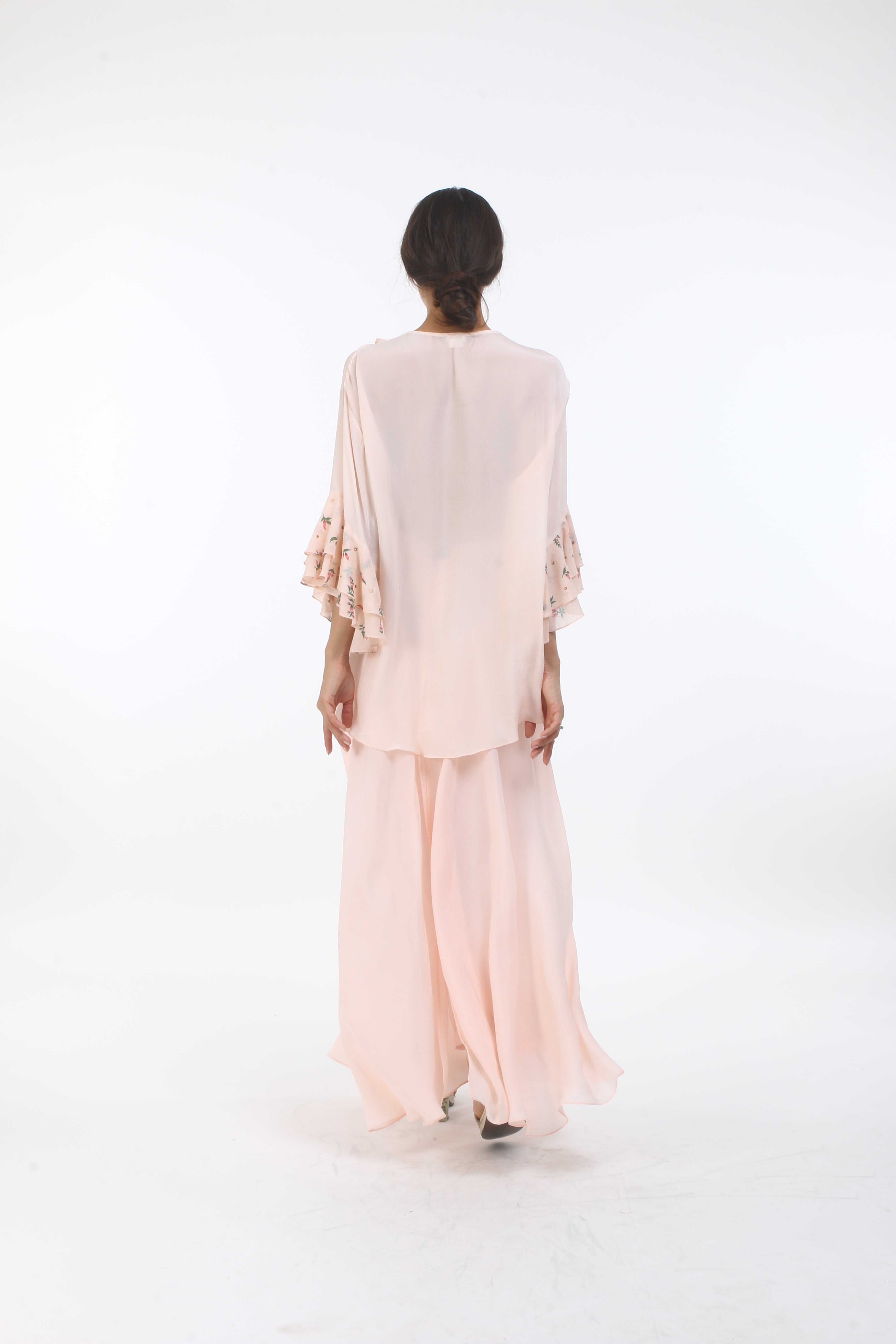 Bloom salmon pink bouquet printed flare sleeved top in crepe.
