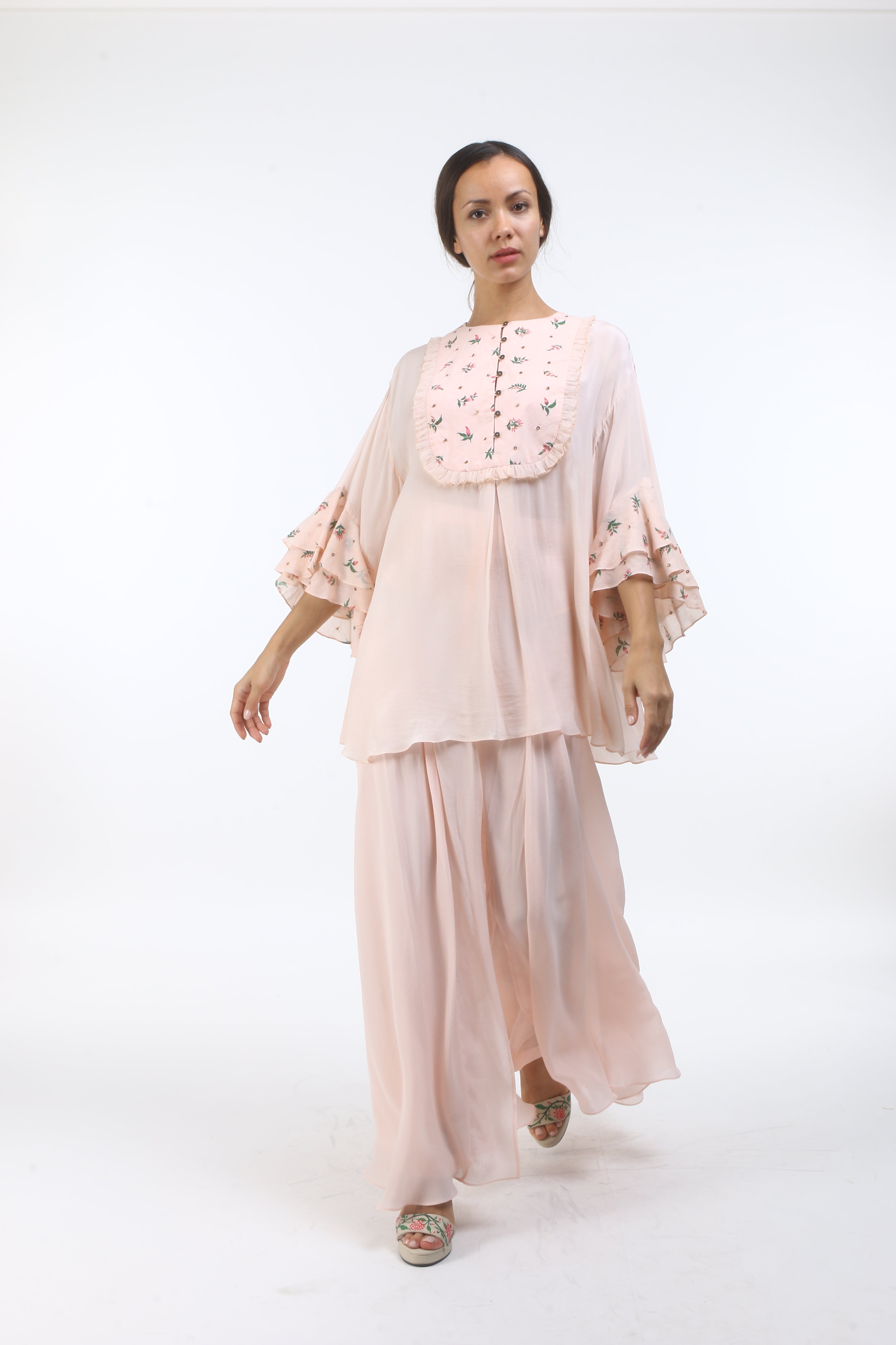 Bloom salmon pink bouquet printed flare sleeved top in crepe.