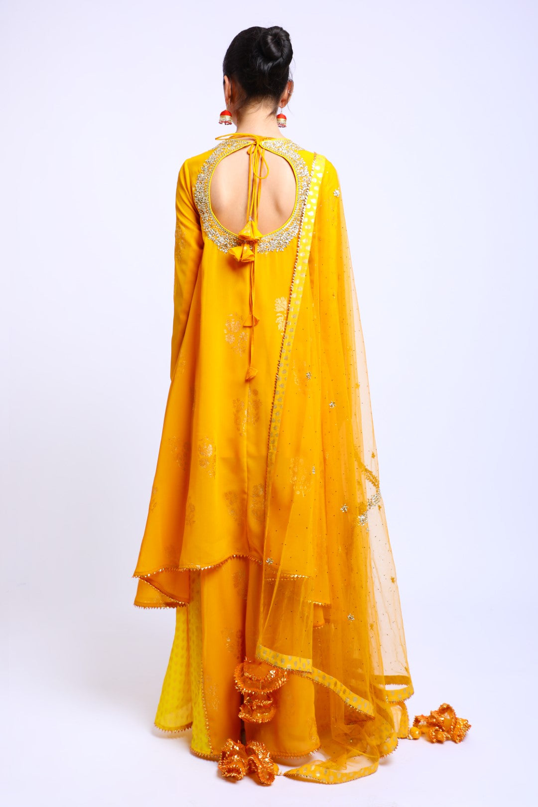 Haldi Yellow Asymmetrical Georgette Emb Kurta paired with Skirt & Dupatta