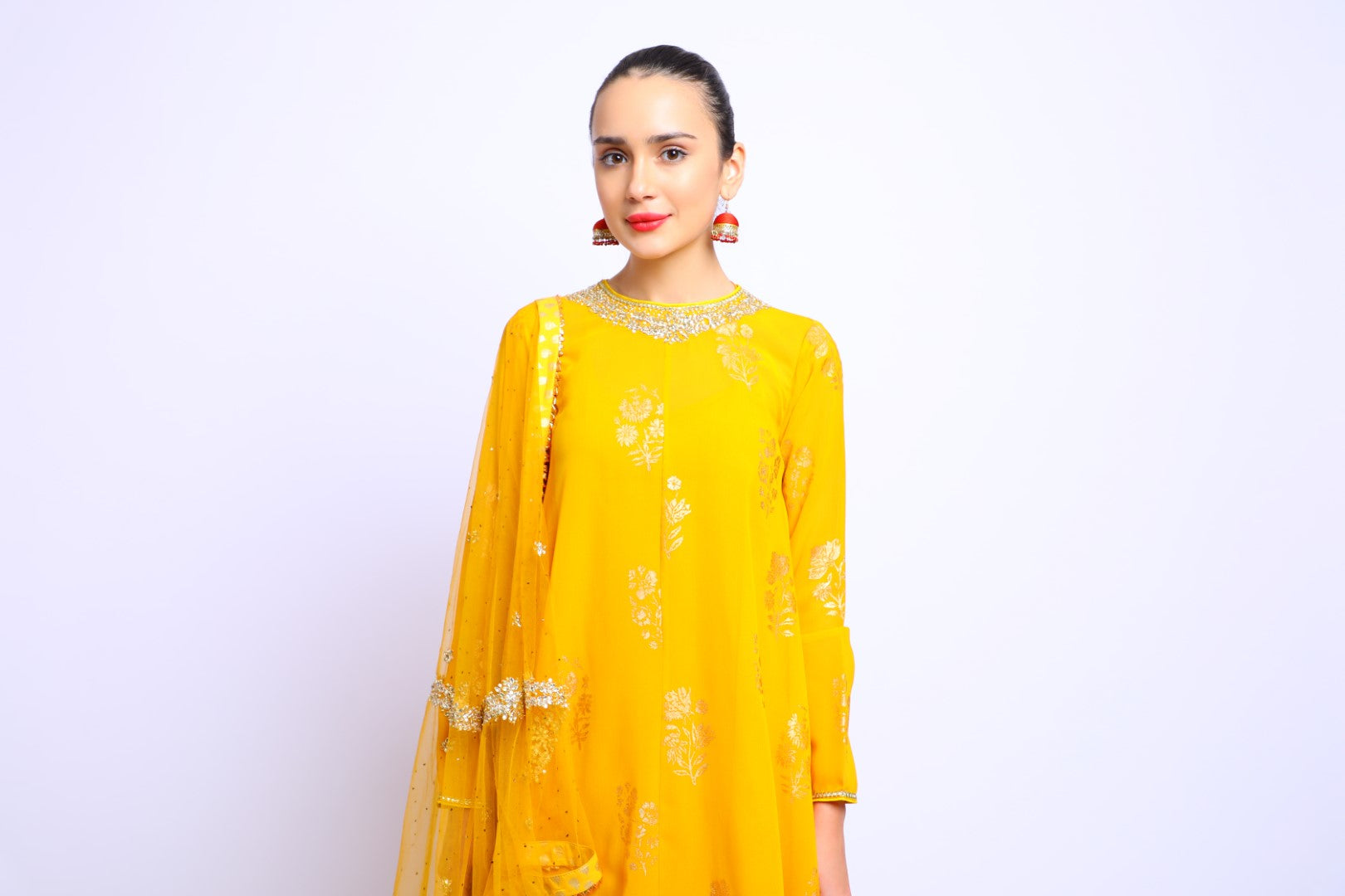 Haldi Yellow Asymmetrical Georgette Emb Kurta paired with Skirt & Dupatta