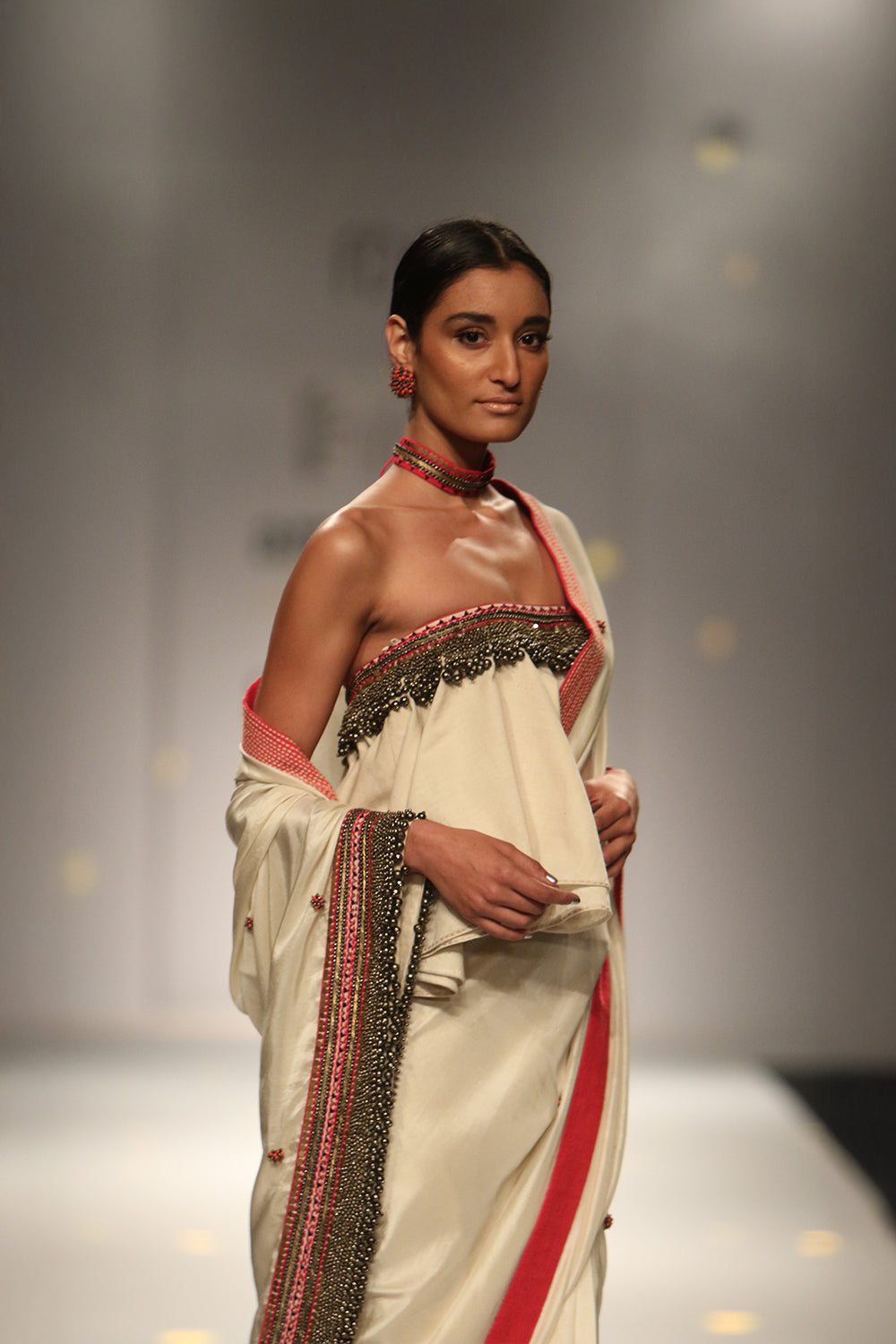 Sonam Kapoor in Ivory Crepe Silk Saree with Ruffled Off-Shoulder Blouse