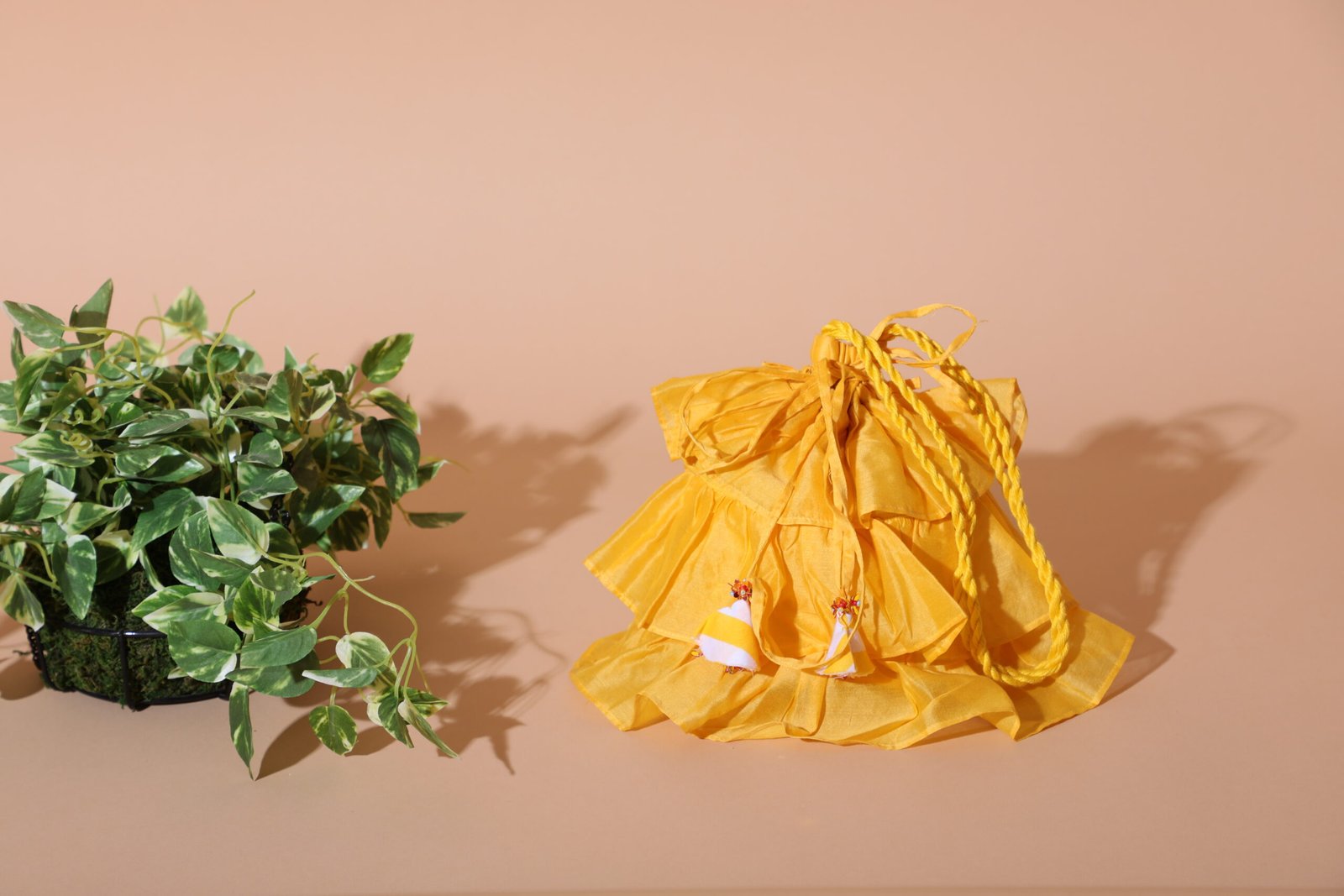 Chanderi 3 tiered frills potli with hand crafted tassel