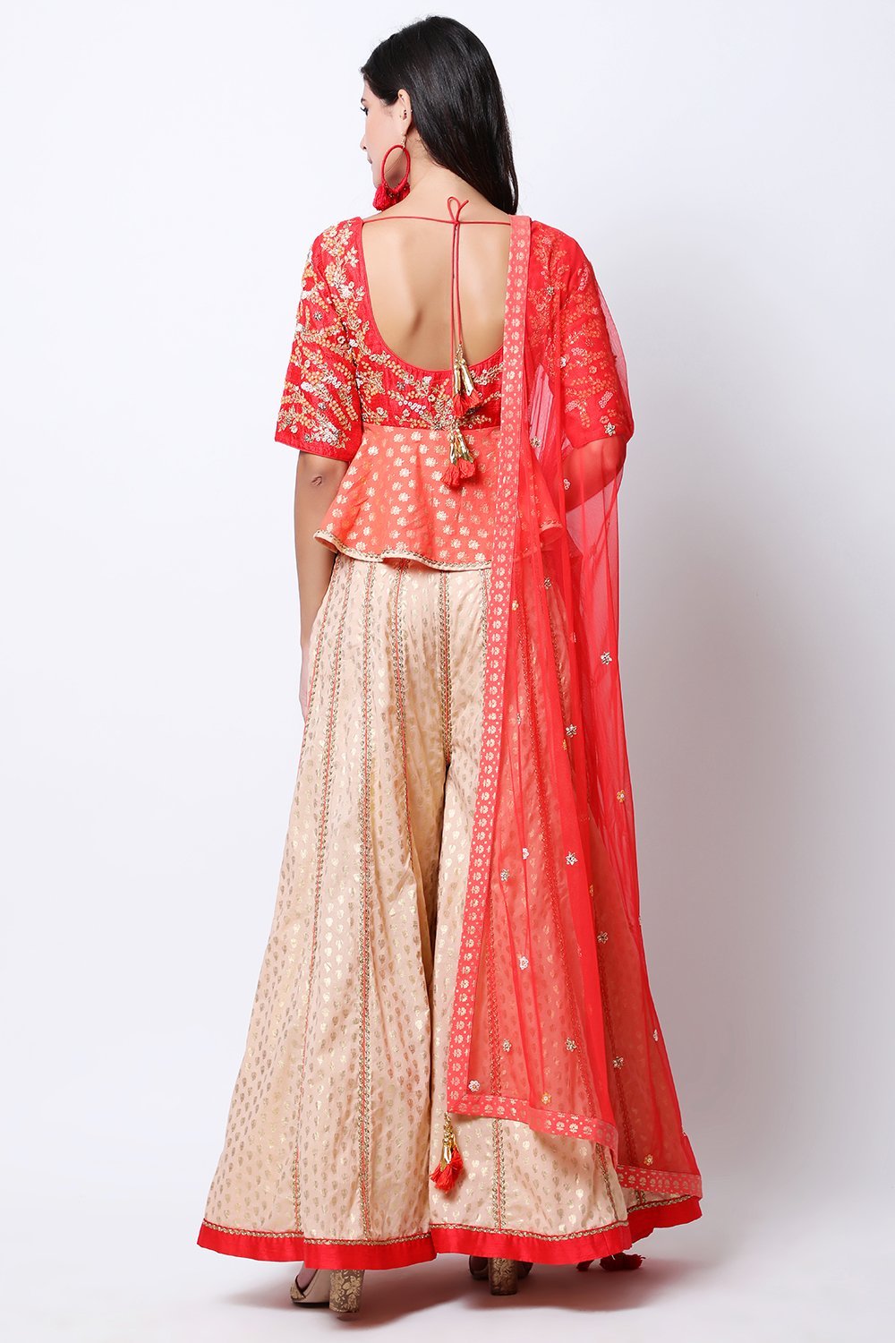 Gajari lotus gold printed peplum blouse with dupatta and light tabacco gold printed jasmine bud sharara.