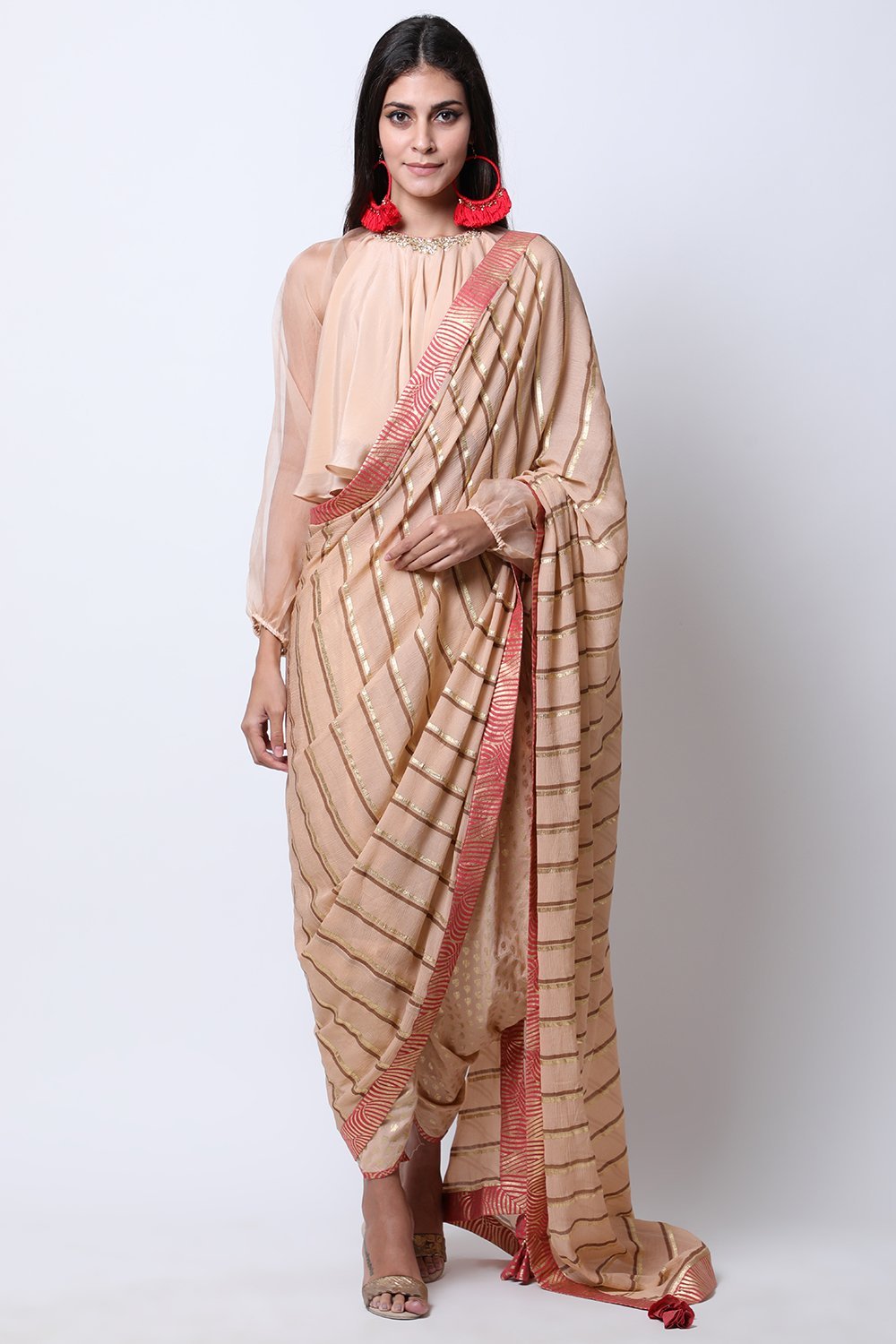 Light Tabacco embroidered blouse , paired with cowl dhoti attached leheriya palla.