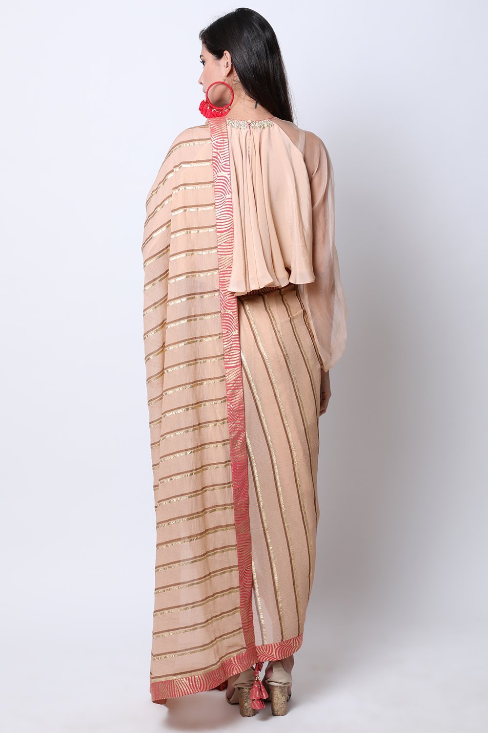 Light Tabacco embroidered blouse , paired with cowl dhoti attached leheriya palla.