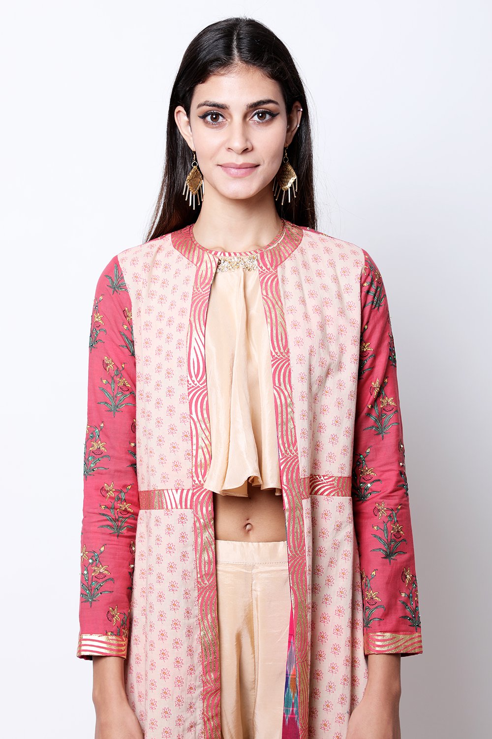 Burgundy and Light Tabacco hand-printed long jacket , paired with flare halter neck top and dhoti.