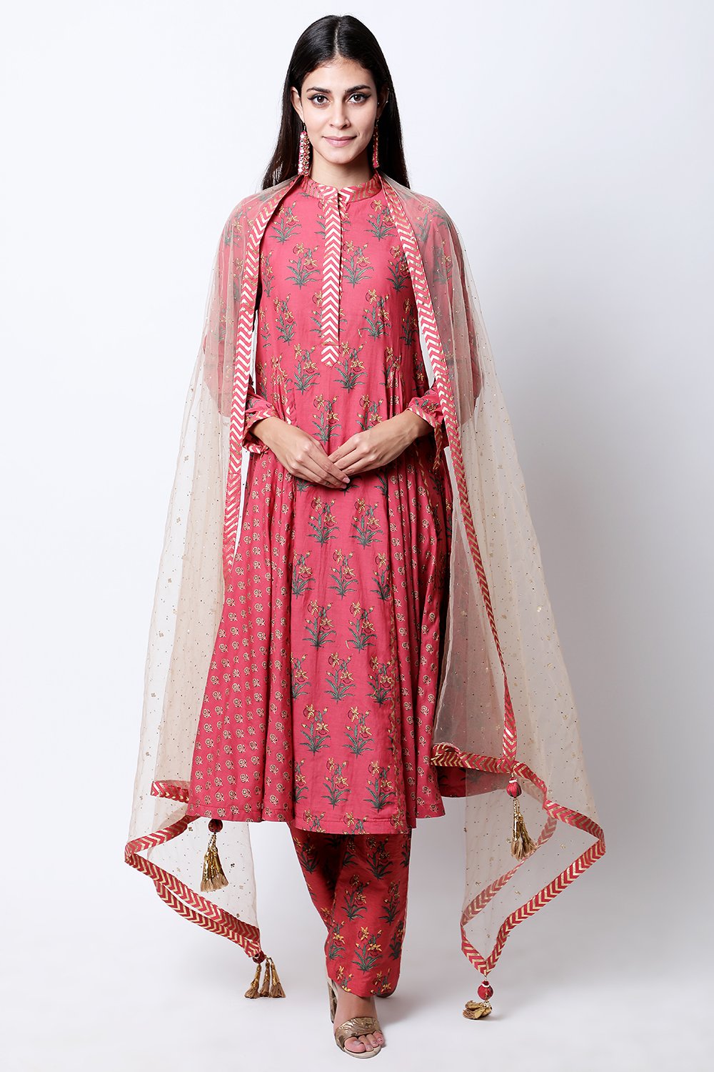 Burgundy hand-printed godet kalidar with ghee dupatta and pants.