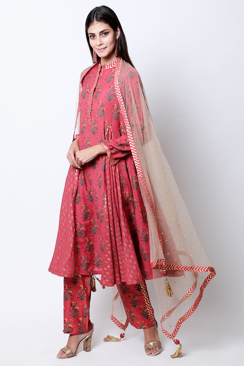 Burgundy hand-printed godet kalidar with ghee dupatta and pants.