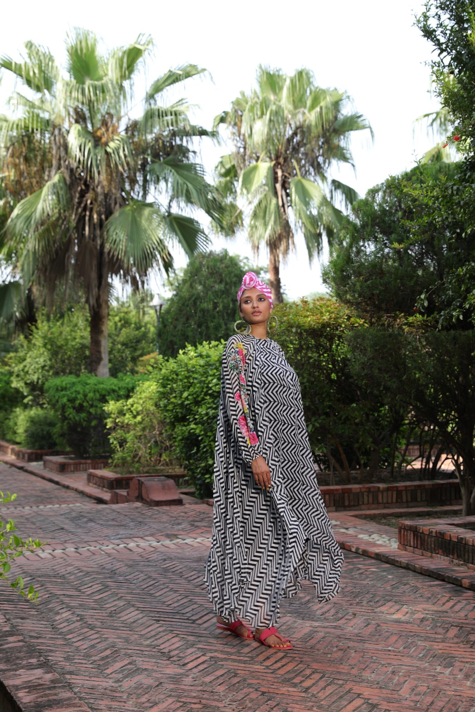 Black chevron Asym ggt dress with embroidered sleeve