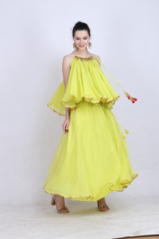 Lime green kota doria halter neck top with a kota doria skirt with gota lace detailing.