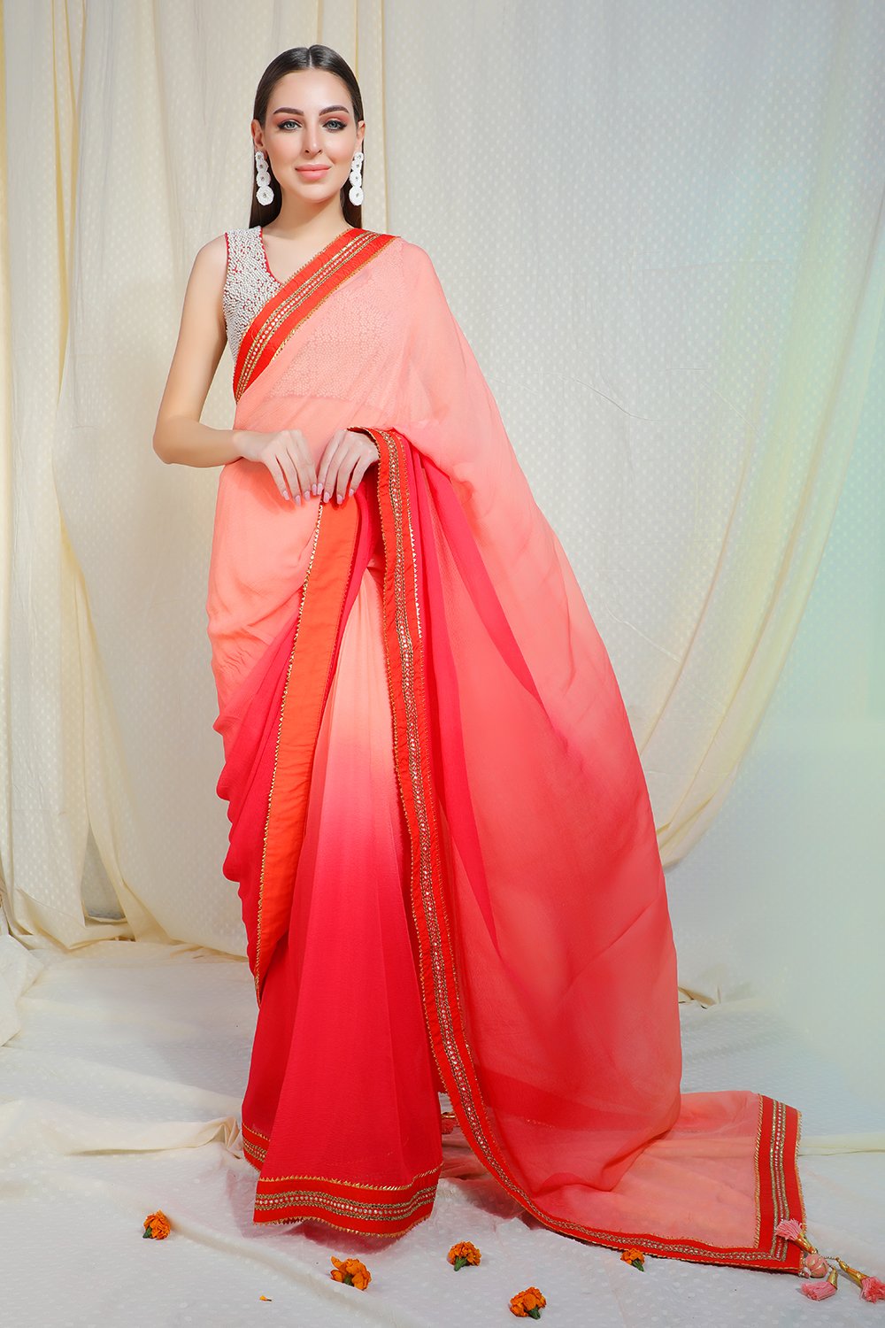 Ombre salmon to coral gajari chiffon saree with abla border