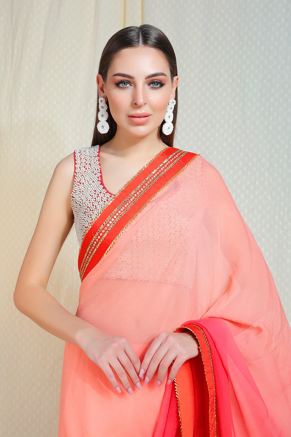Ombre salmon to coral gajari chiffon saree with abla border