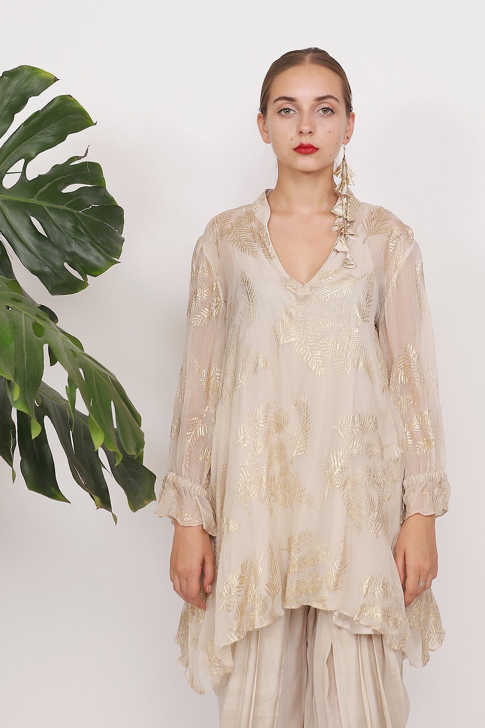 Gold printed asymmetrical tunic with cowl dhoti