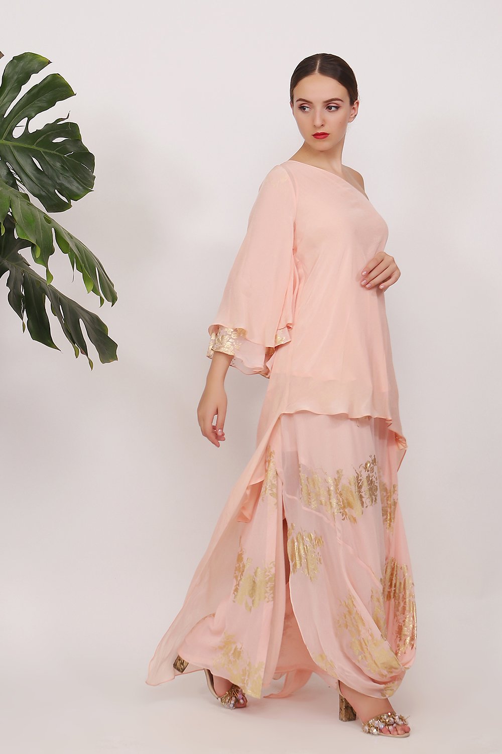 Off shoulder top and side godet gold printed with cowl skirt