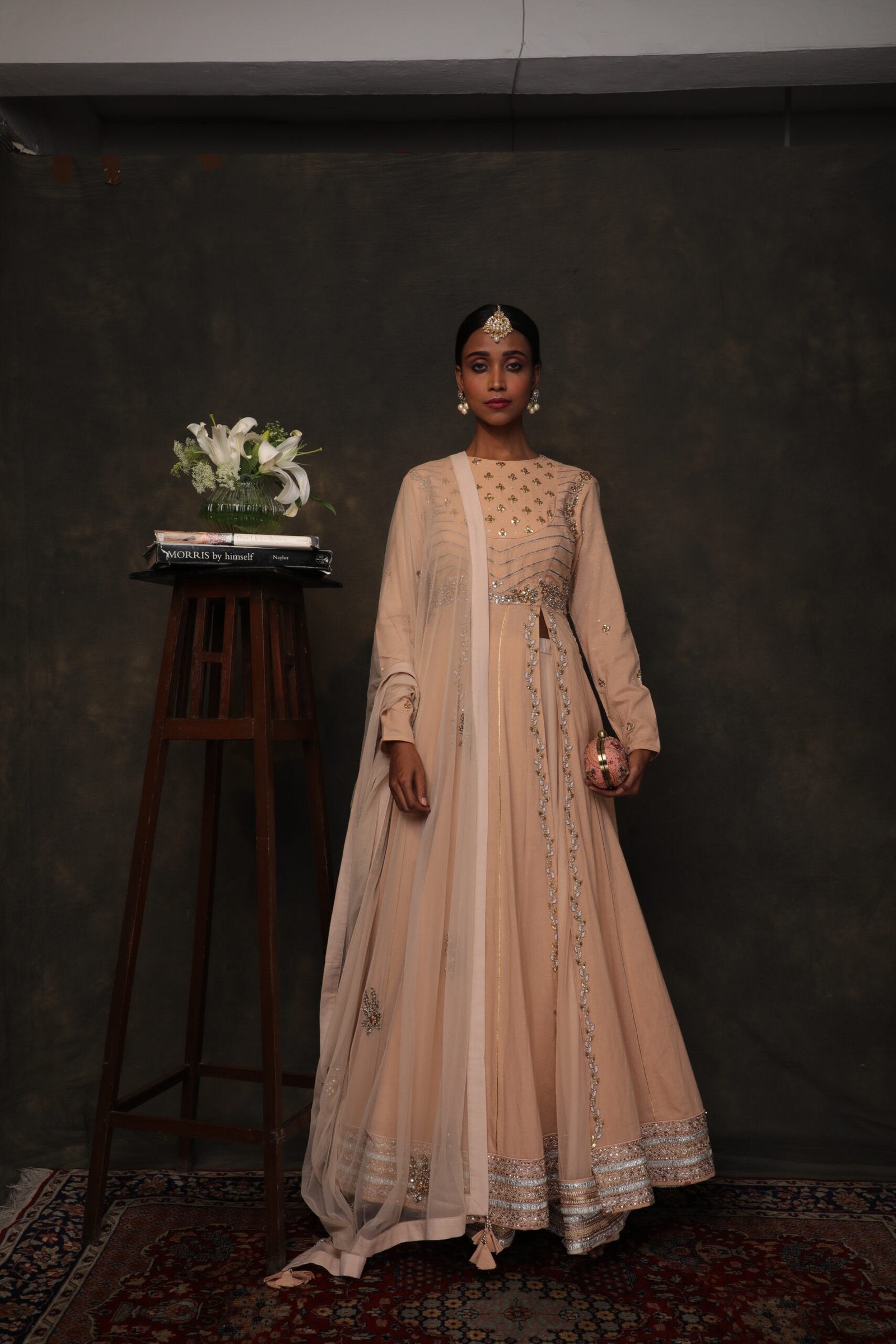 caramel kalidar with a soft net double layer skirt and ghee dupatta