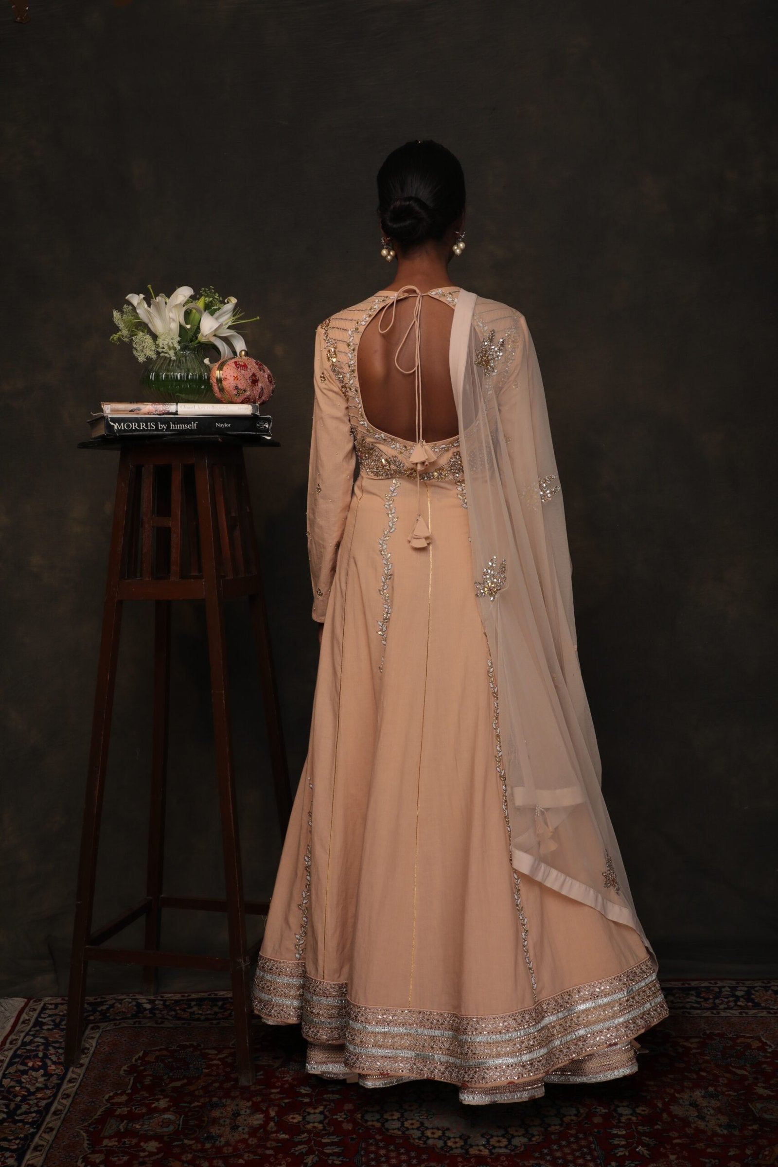 caramel kalidar with a soft net double layer skirt and ghee dupatta