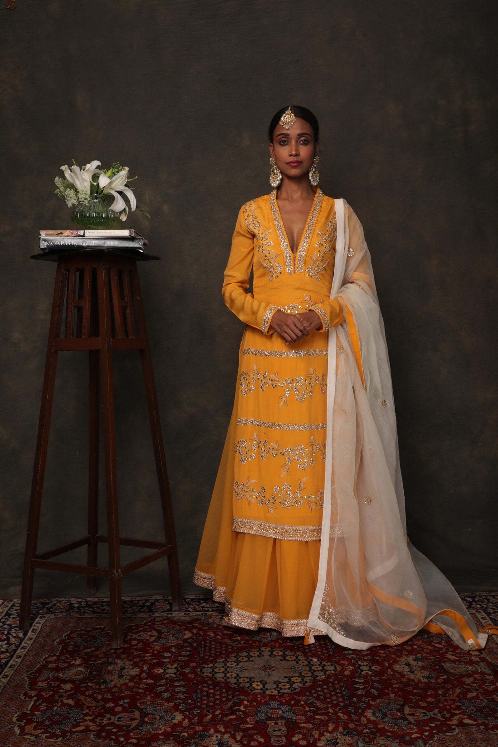 Lily ochre crepe kurta with a soft net skirt and a hand embroidered dupatta