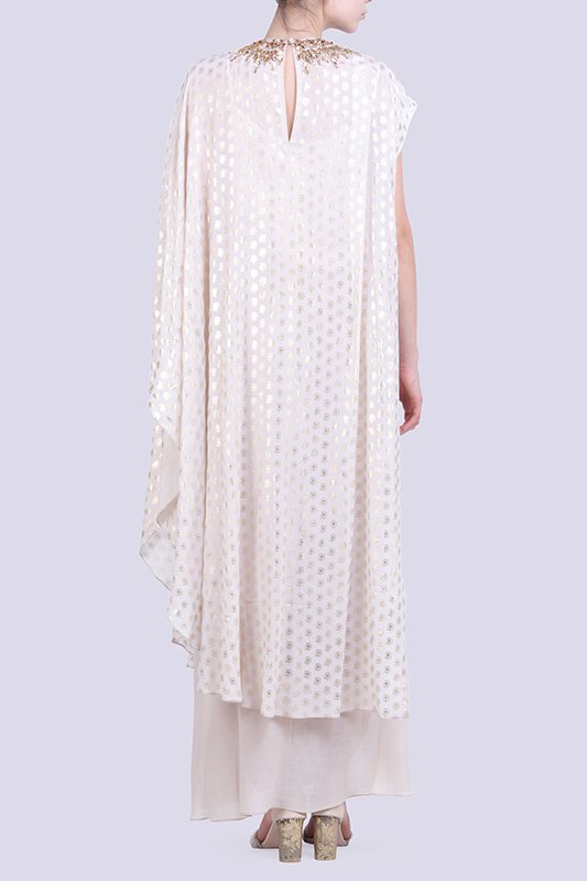 Ghee gold foil printed kaftan with a printed cowl skirt.