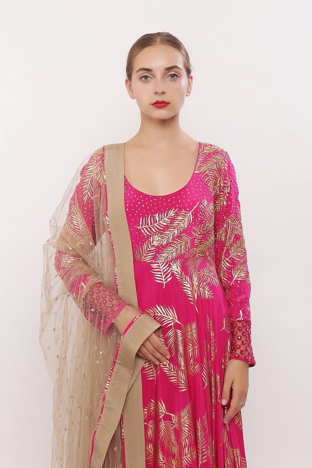 Gold printed anarkali with net frills along chudidaar and dupatta