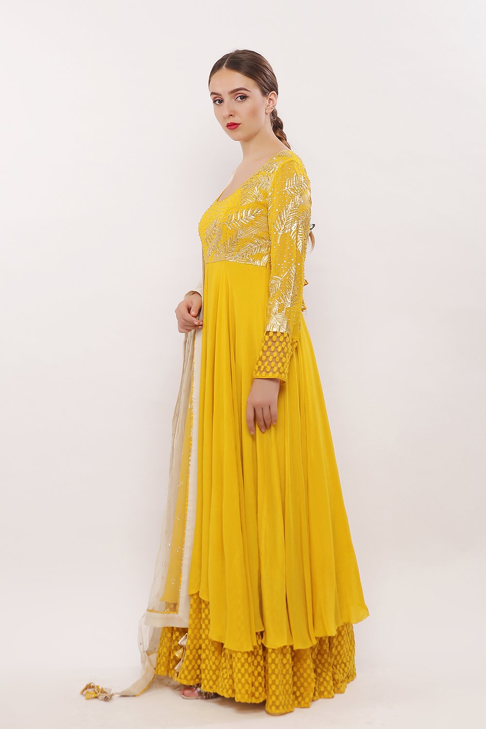 Asymmetrical anarkali with net frills along chudidaar and dupatta