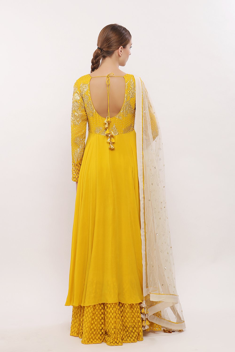 Asymmetrical anarkali with net frills along chudidaar and dupatta