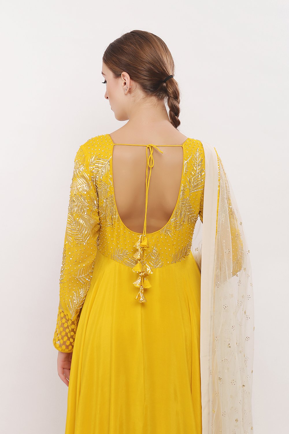 Asymmetrical anarkali with net frills along chudidaar and dupatta