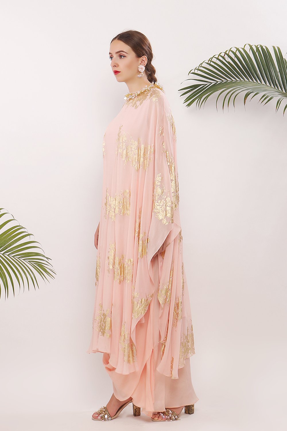 One pleat shoulder kaftan and embroidered neckline along with cowl skirt
