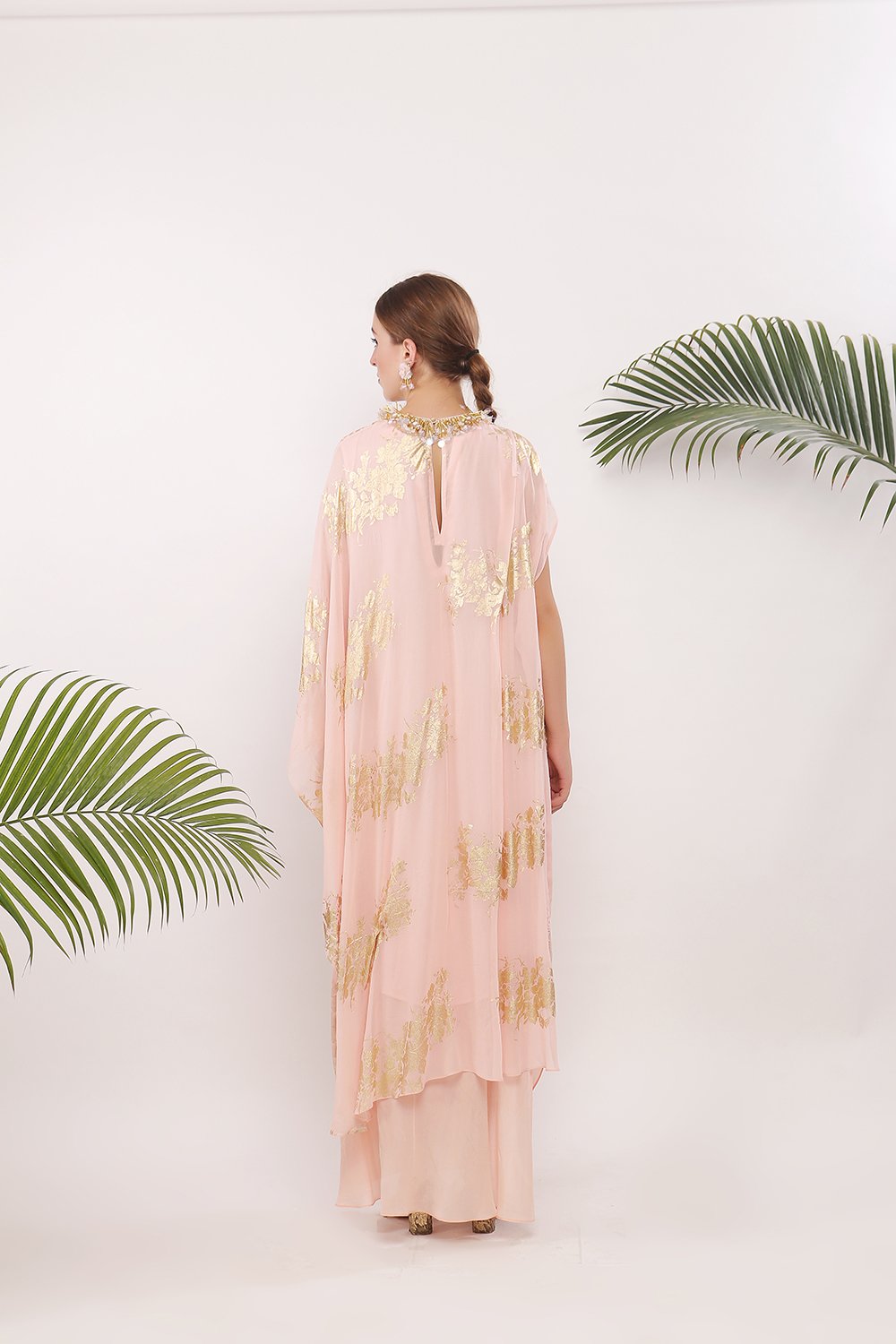 One pleat shoulder kaftan and embroidered neckline along with cowl skirt