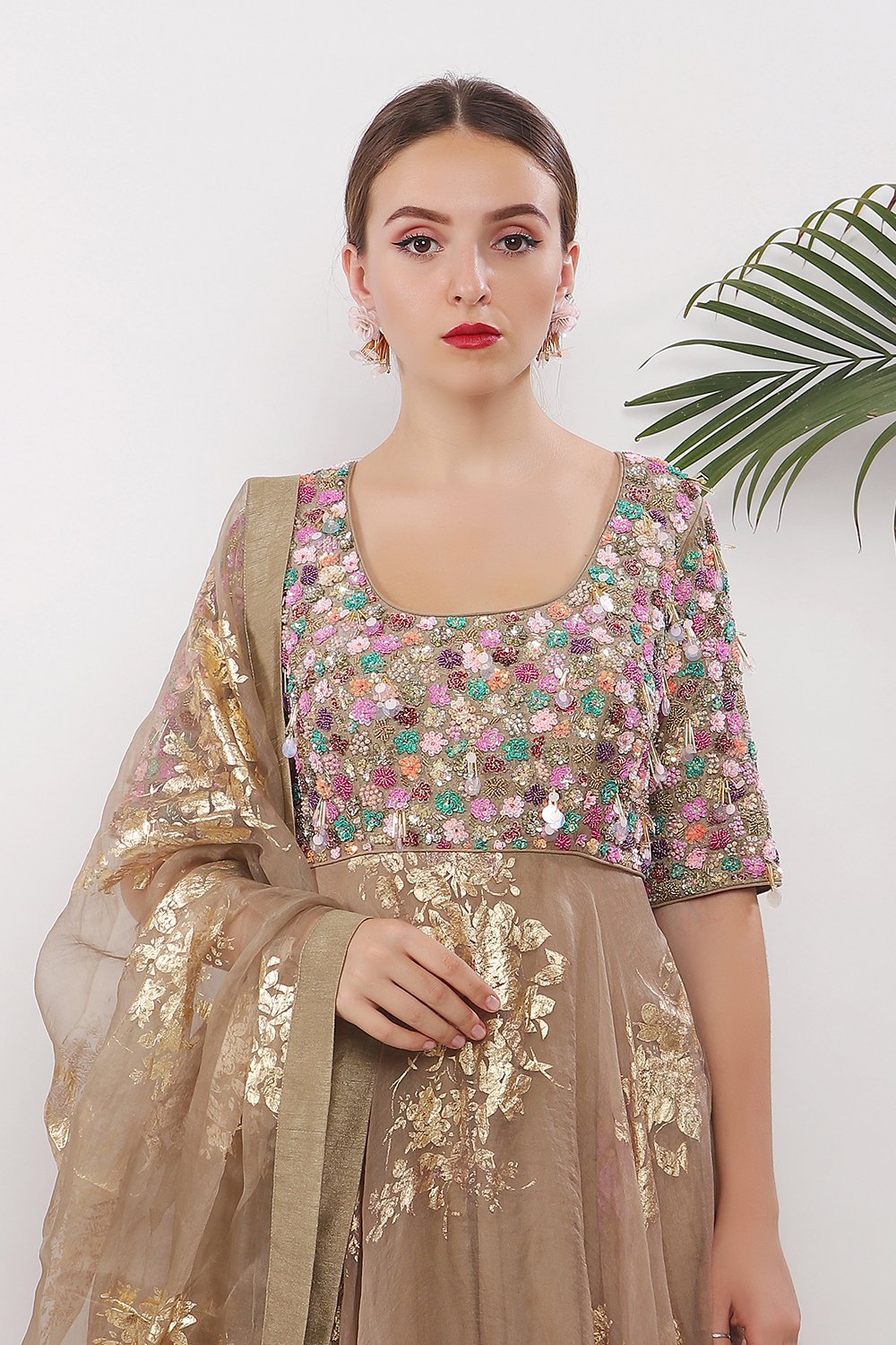 Embroidered yoke and gold printed ghera with dupatta and churidaar
