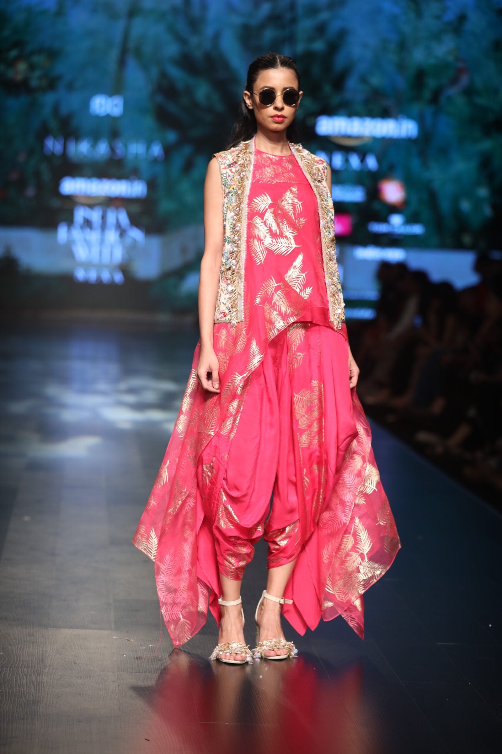 fully embroidred jacket with asymetical top paired with printed panel cowl dhoti