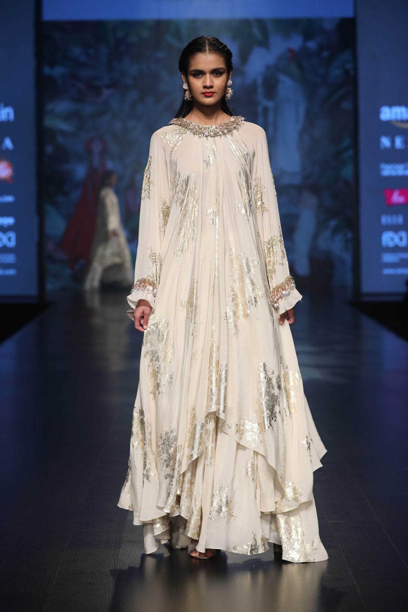 gold printed asymetrical tunic with gold printed asymetric skirt