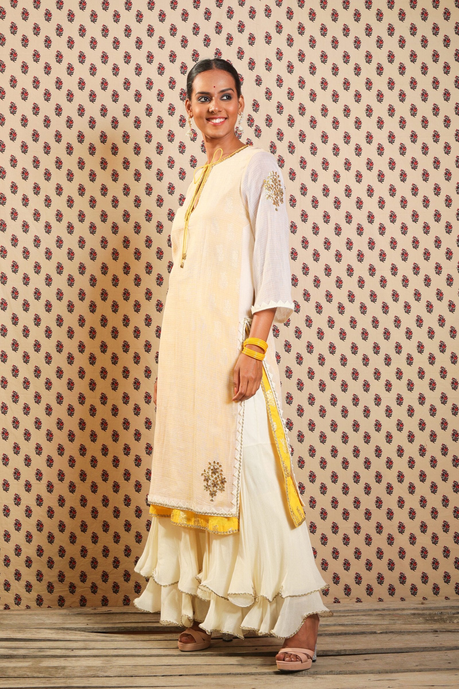 Ivory and yellow hand woven kota doria kurta set with sharara and dupatta