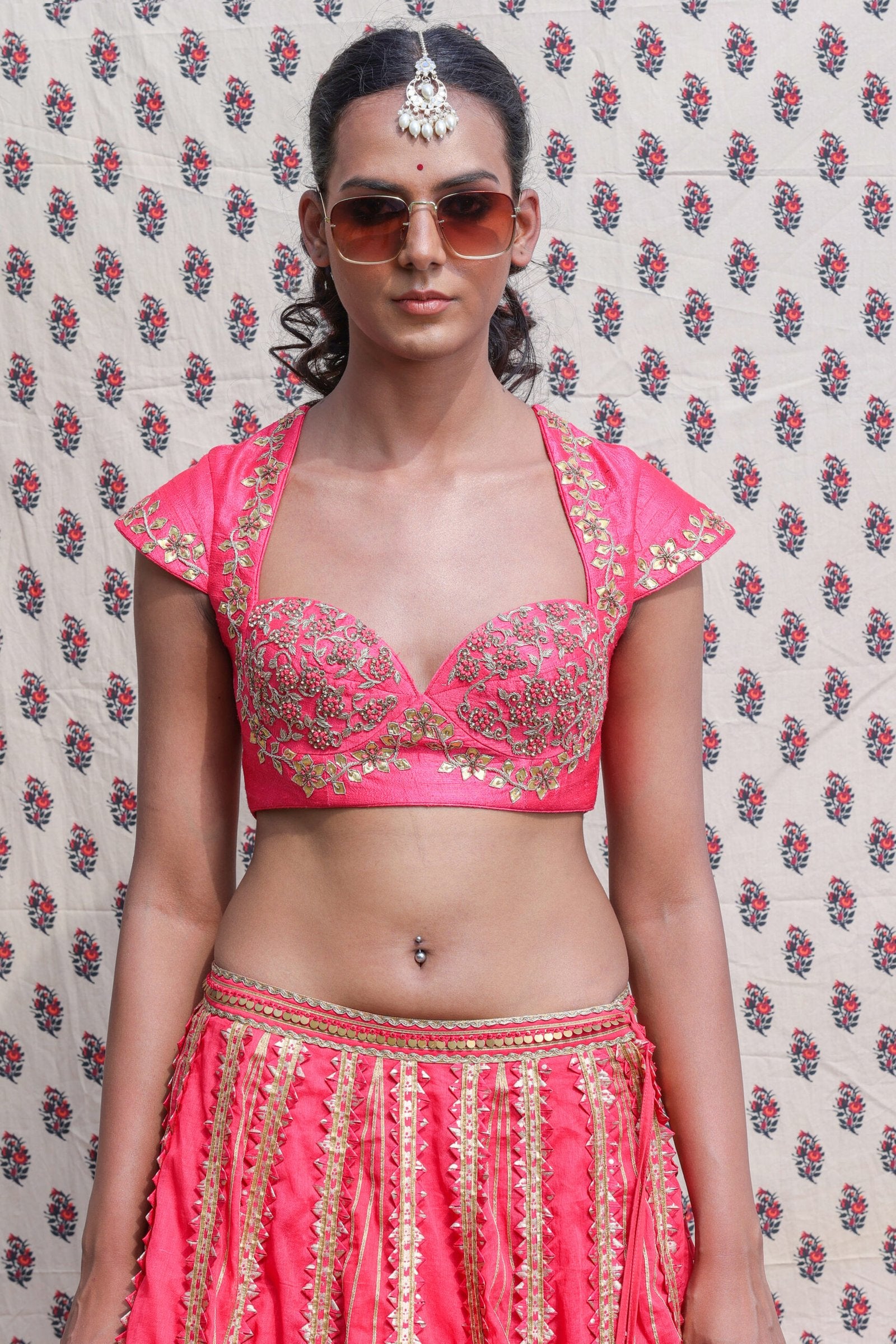 Coral red cotton silk blouse with organdi lehenga and dupatta