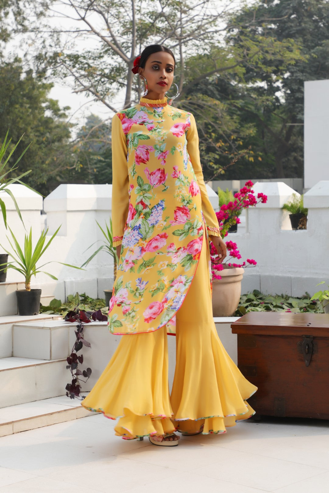 Ochre crepe vintage rose kurta teamed with double layer georgette sharara.