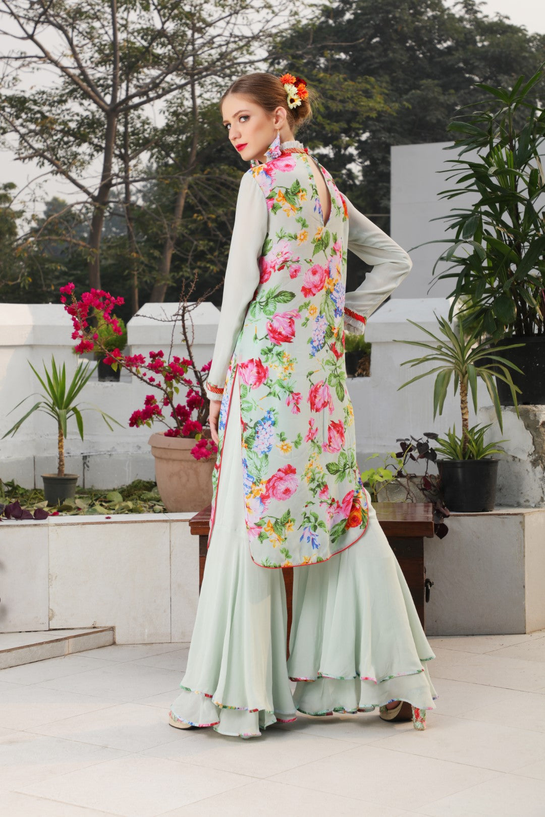 Mint crepe vintage rose kurta teamed with double layer georgette sharara.