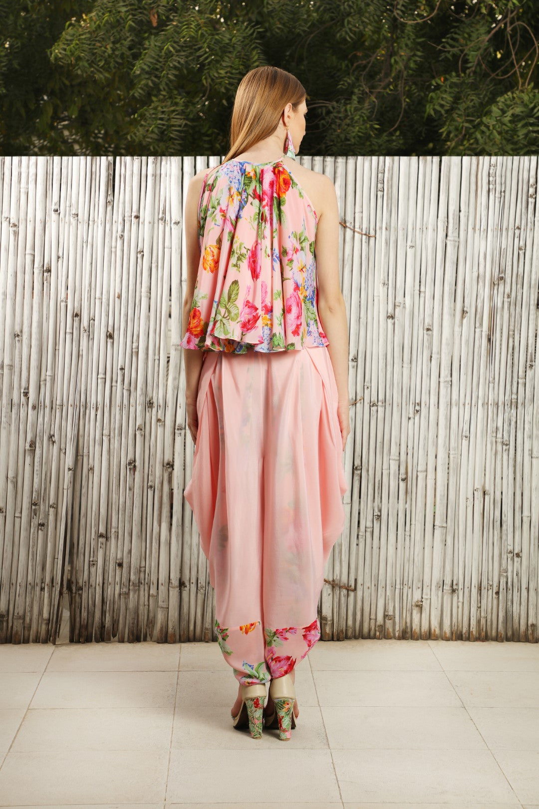 Soft pink vintage rose halter top, teamed with a cowl dhoti.