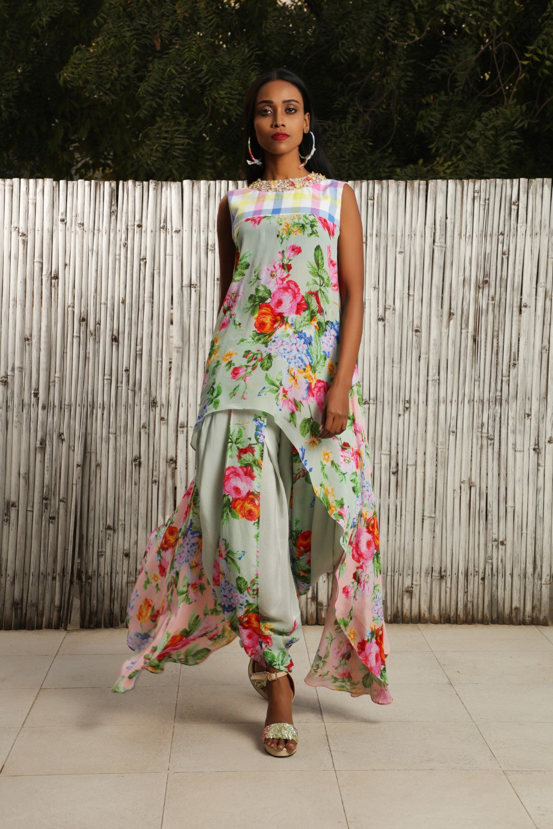 Asymmetrical mint vintage rose tunic with teamed with crepe cowl dhoti with VR on front panel.