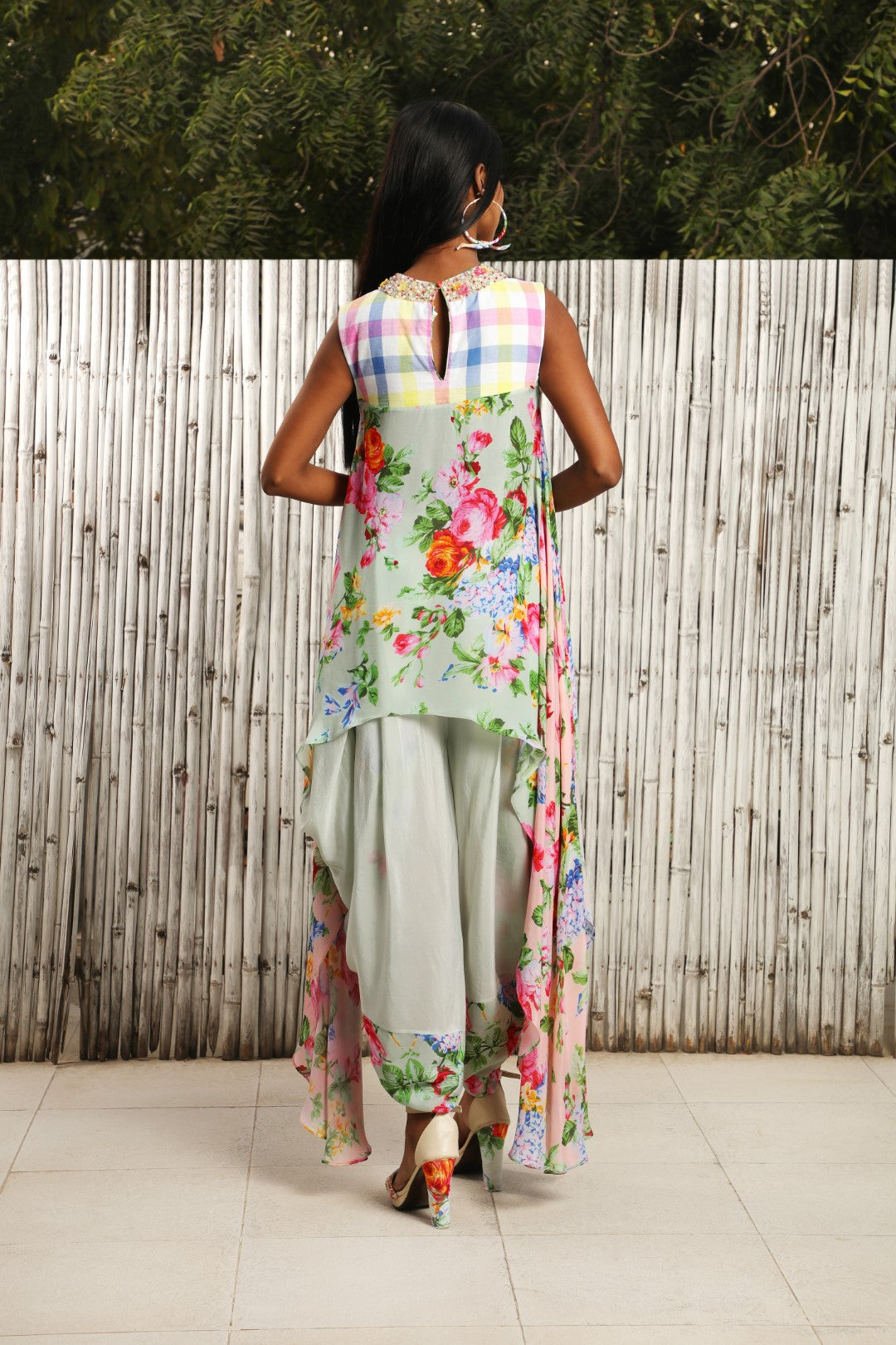 Asymmetrical mint vintage rose tunic with teamed with crepe cowl dhoti with VR on front panel.