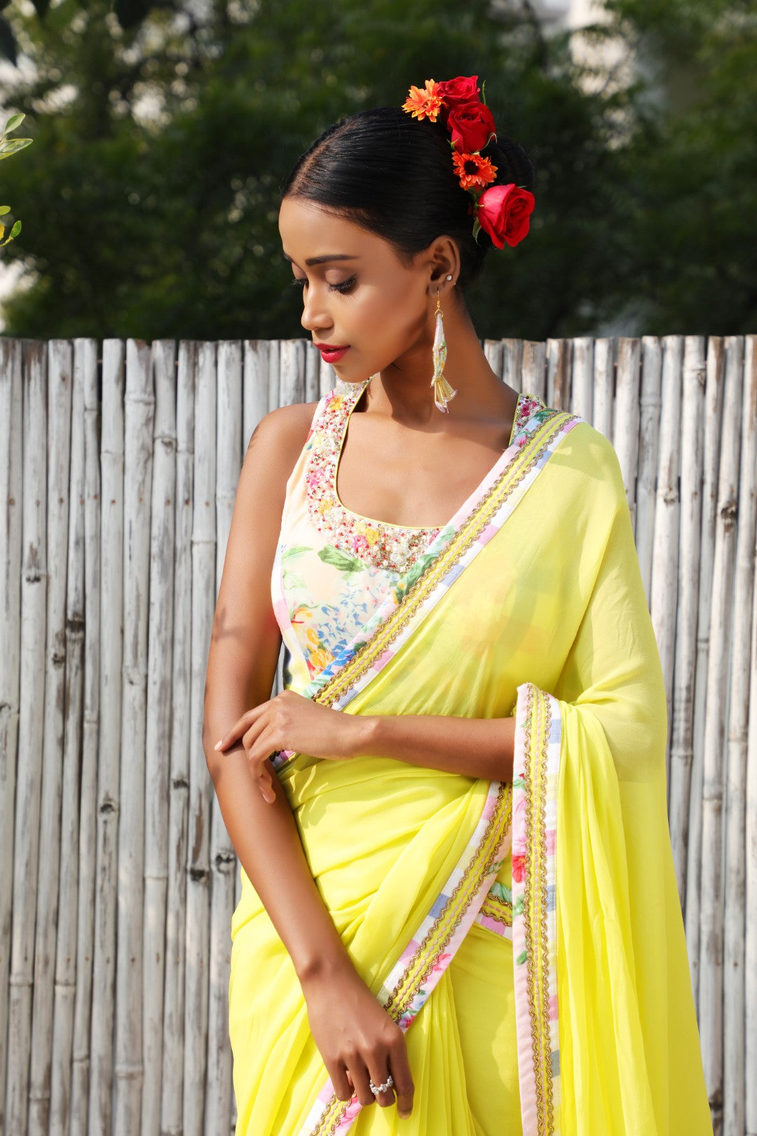 Plain limegreen georgette saree with vintage rose and checks border.